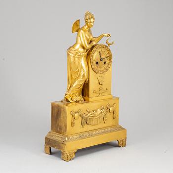 A French Empire mantel clock, beginning of the 19th ct.