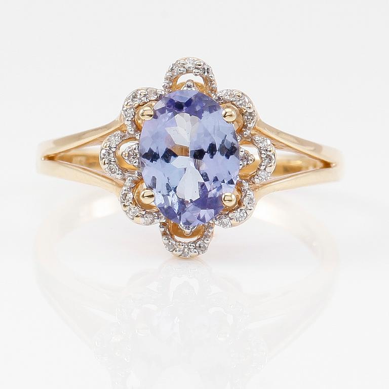 RING, 14K guld, tanzanit och mindre diamanter.