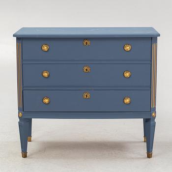 A Gustavian style chest of drawers, mid 20th Century.