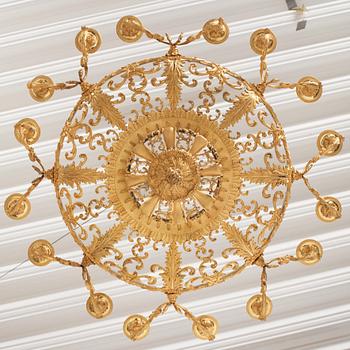 A rococo-revival gilt-brass sixteen-light chandelier, mid 19th century.