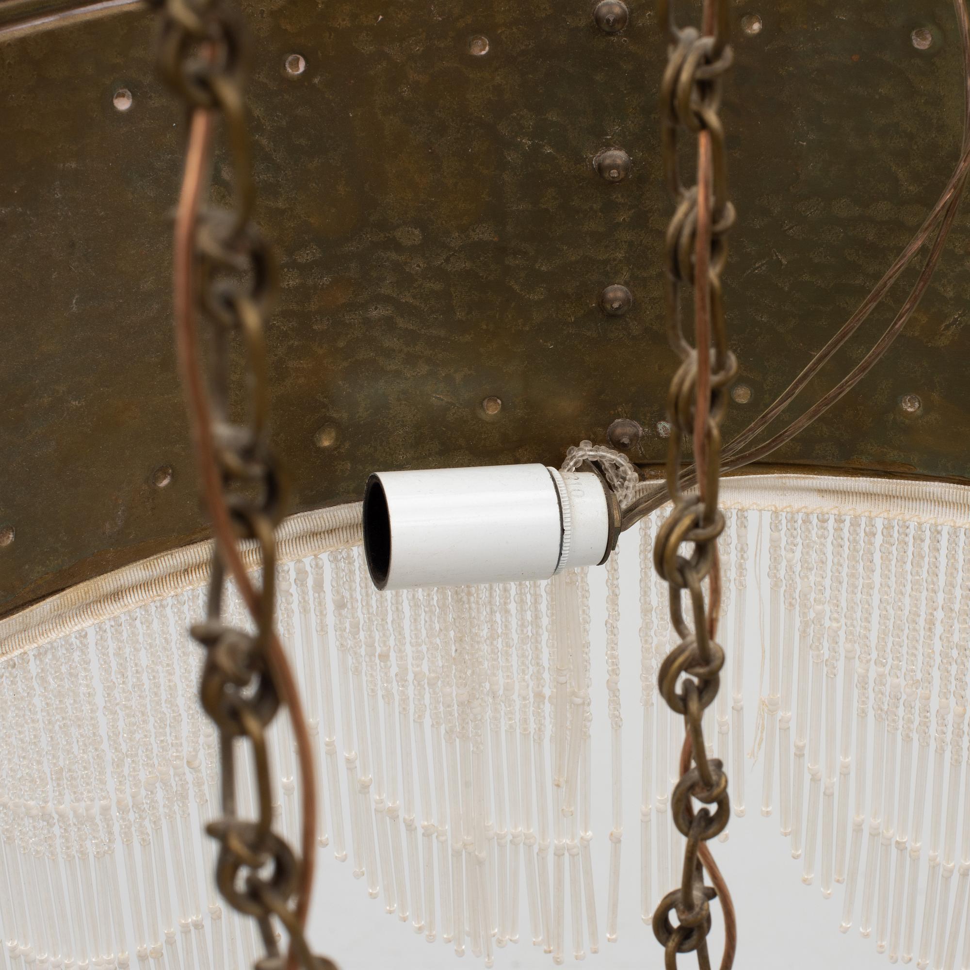 An art noveau ceiling lamp, early 20th century.