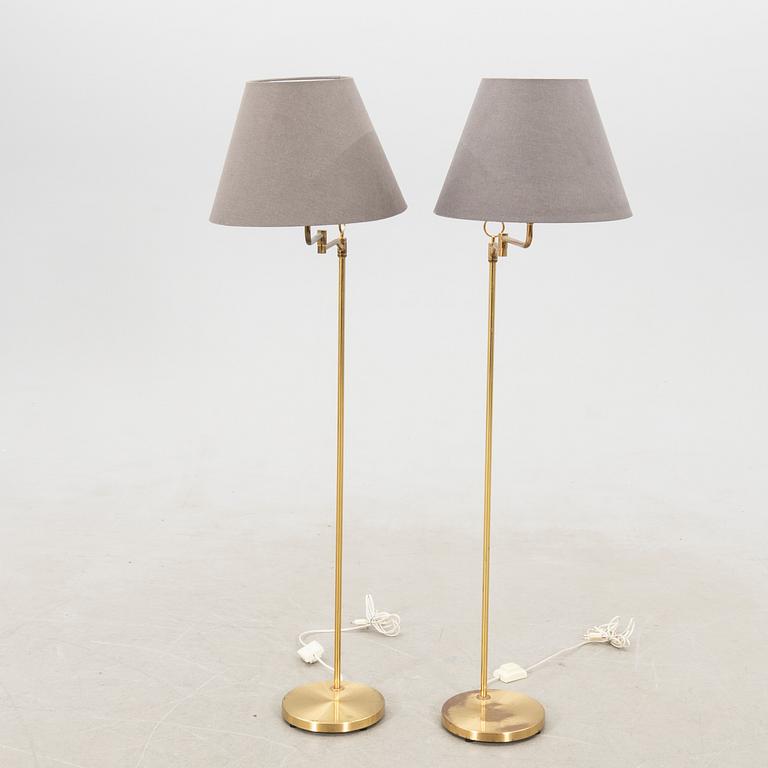 Floor lamps a pair Fixture craftsmanship late 20th century.