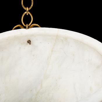 An Empire alabaster lamp, early 19th Century.