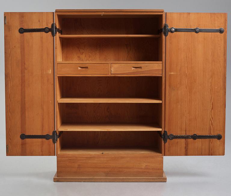 Axel Einar Hjorth, a stained pine 'Lovö' cabinet, Nordiska Kompaniet, Sweden 1930s.