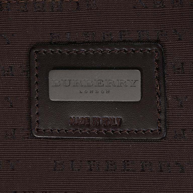 Burberry, a Nova Check canvas suitcase.