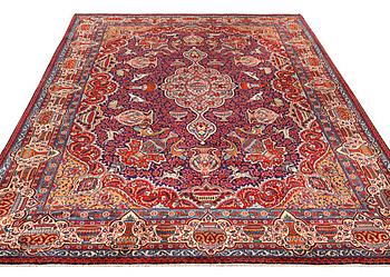 A Kashmar carpet, c. 415 x 285 cm.