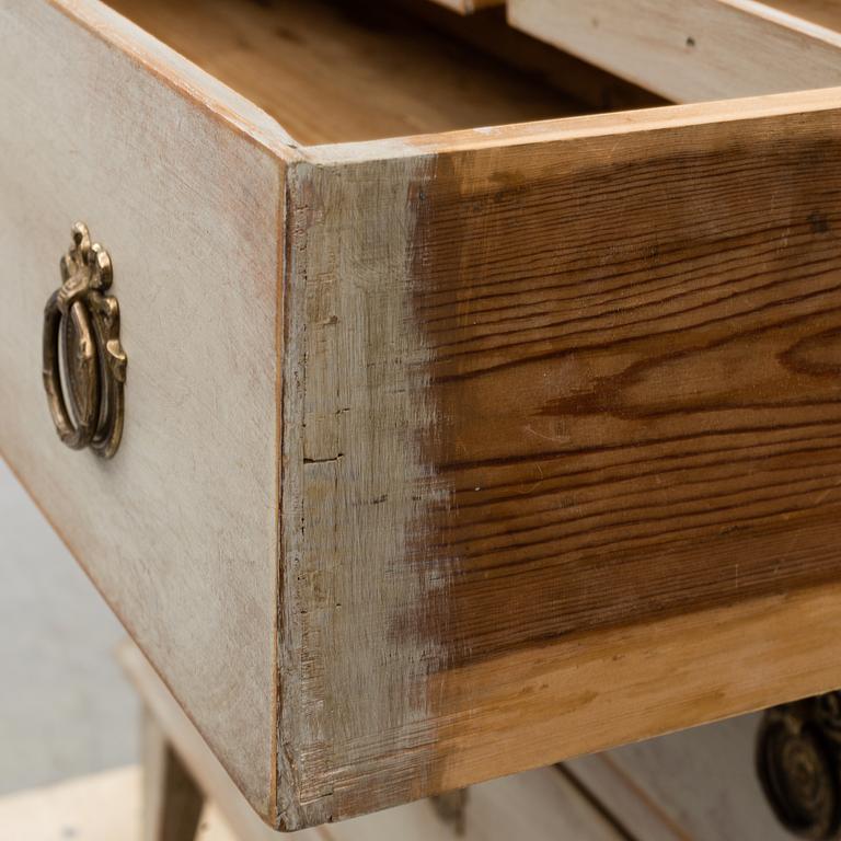 A mid 19th century painted chest of drawers.