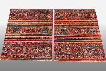 A pair of rugs, Khorjin, ca 128 x 82 cm & ca 123 x 84 cm.