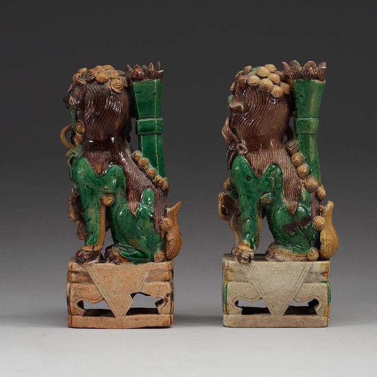 Two green, aubergine and yellow glazed bisquit joss stick holders, Qing dynasty, Kangxi (1662-1722).