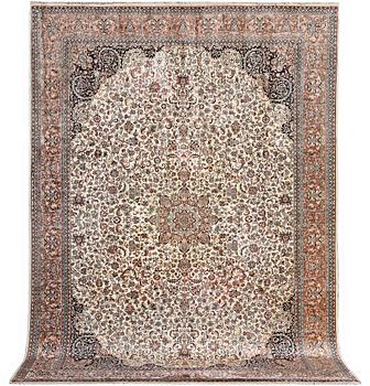 A carpet, silk Kashmir, ca. 358 x 252 cm.