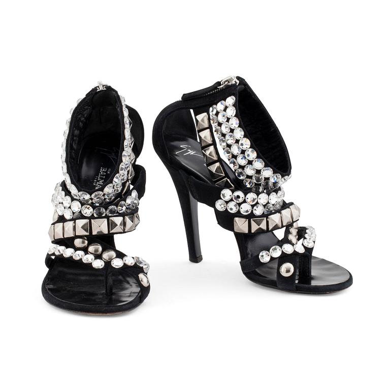 BALMAIN, a pair of black suede sandals with decorative embellishment.