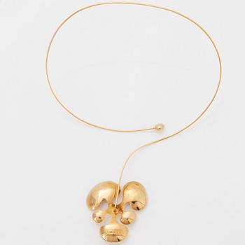 An 18K gold Wolfgang Gessl necklace.