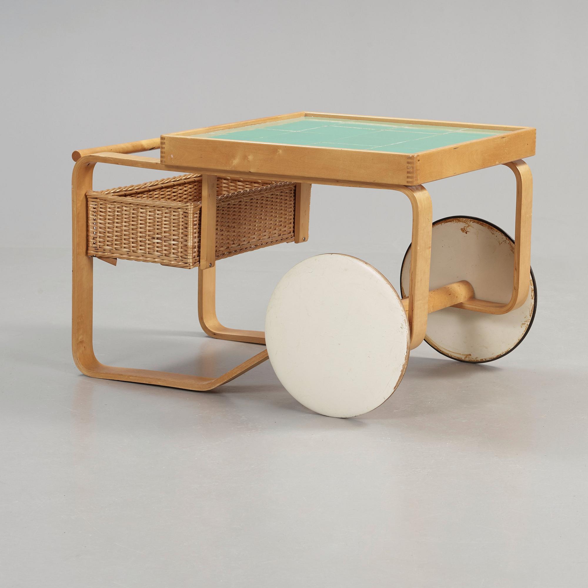 An Alvar Aalto birch serving trolley, made on license by Aalto design Hedemora on behalf of Artek, Sweden 1946-56.