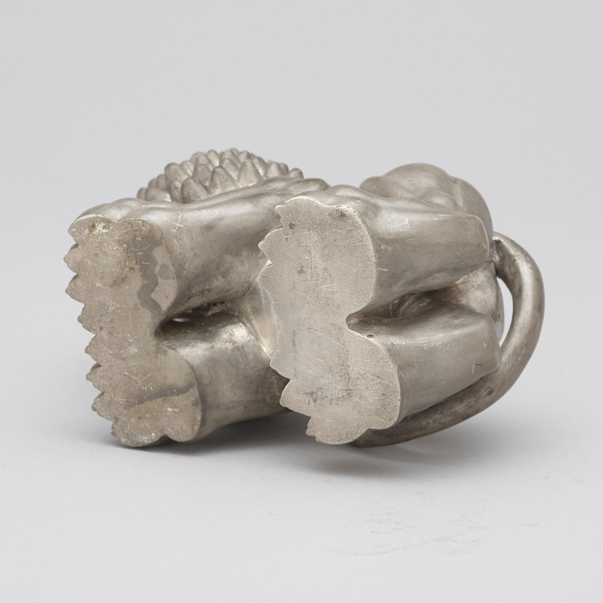 An Anna Petrus pewter sculpture of a lion, Svenskt Tenn, Stockholm 1920's-30's.