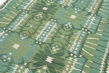 Barbro Nilsson, a carpet, 'Strålblomman grön', tapestry weave, c. 316 x 232 cm, signed AB MMF BN.