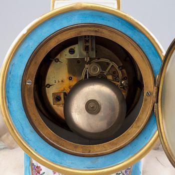 A 19th century porcelain mantle clock, probably France.