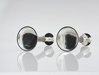 Henrik Ingemansson, a pair of sterling silver and Älvdal porphyry candelsticks, Ingemansson's Smithy, Stockholm, 2002.