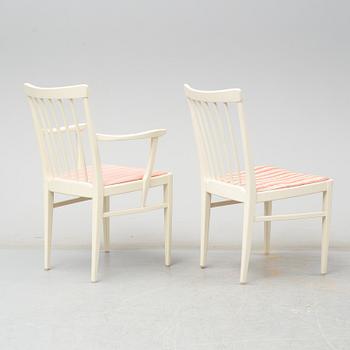 A dining table with four chairrs and two armchairs by Carl Malmsten from Åfors.