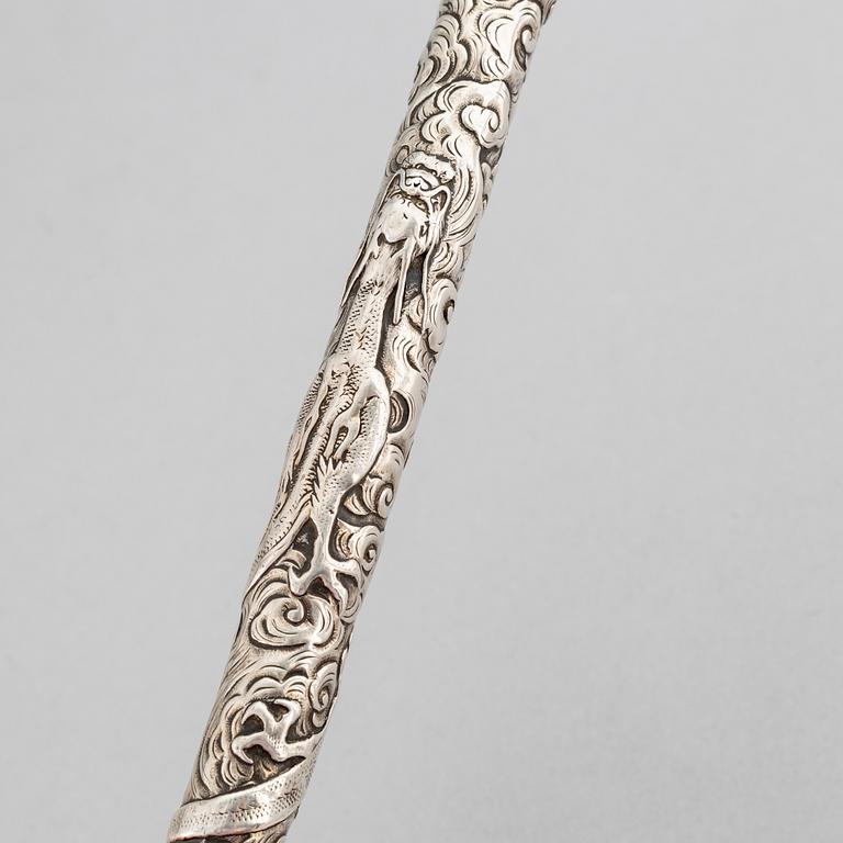 A Japanese silver opium pipe, Meiji period (1868-1912).