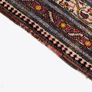 A carpet, antique/semi-antique, Western Persia, ca 575 x 315 cm.