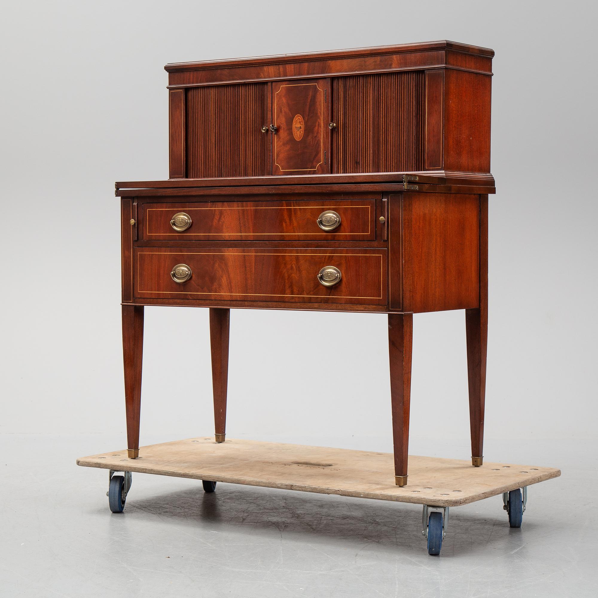 A gustavian style secretaire from the mid 20th century.