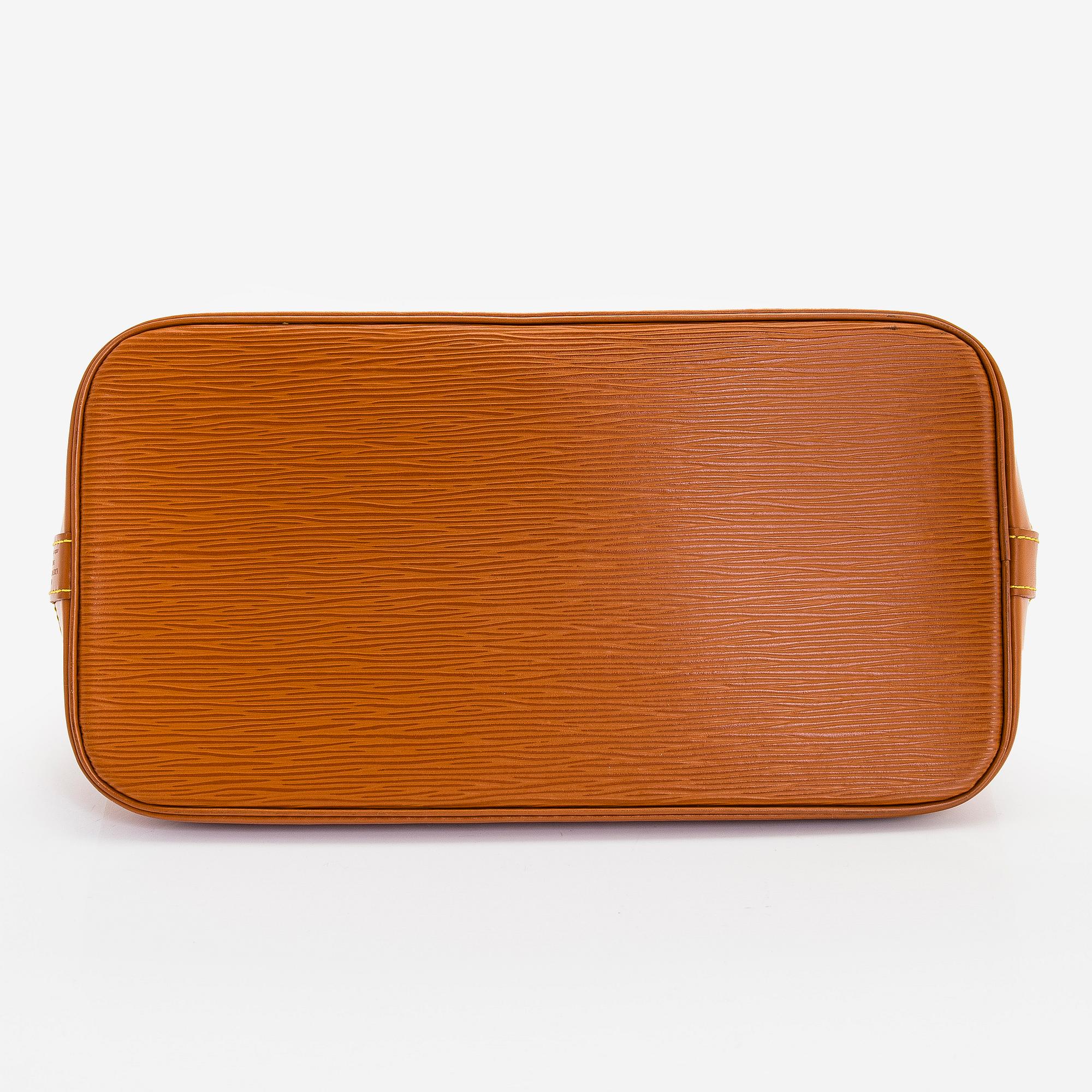 Louis Vuitton, an Epi Leather "Alma" bag.