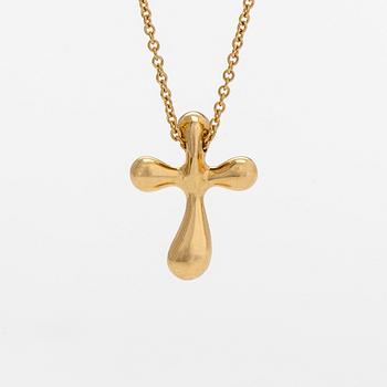 Tiffany & Co, Elsa Peretti, an 18K gold cross pendant necklace.