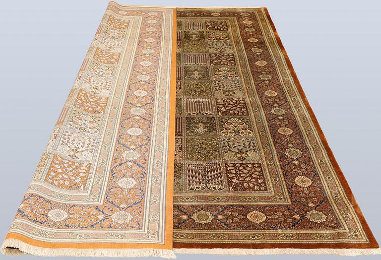 A Gohm silk rug, signed, approx. 307 x 195 cm.