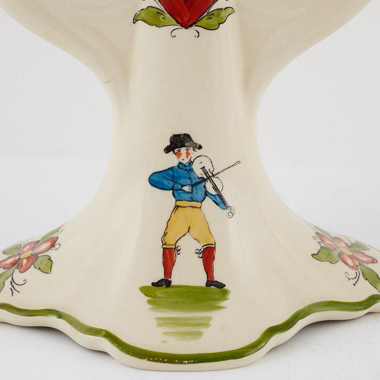 A pair of 'Daladansen' creamware candelabra from Rörstrand, Art Nouveau, early 20th Century.