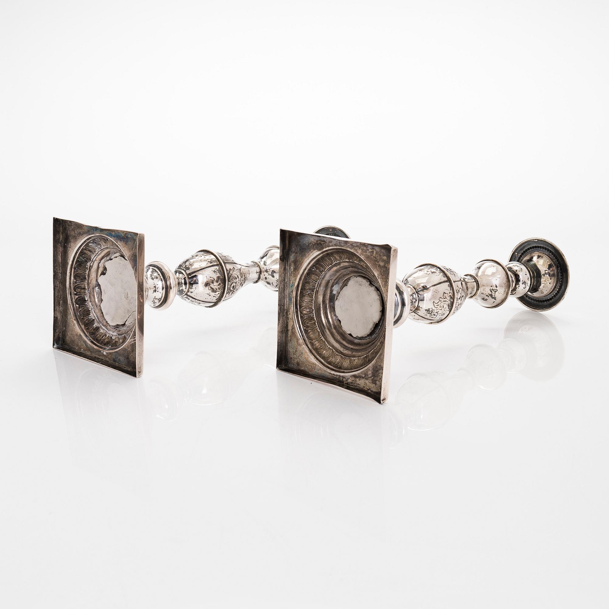 A pair of Sabbath candlesticks in low-grade silver, Poland. Unidentified makers mark.