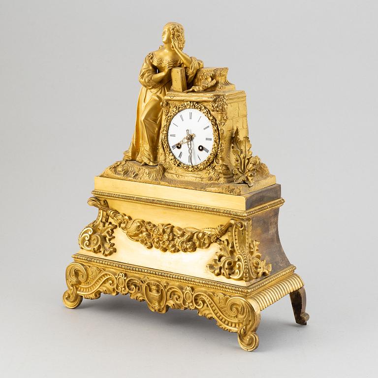 A rococo style brass mantle clock, second half of the 19th Century.