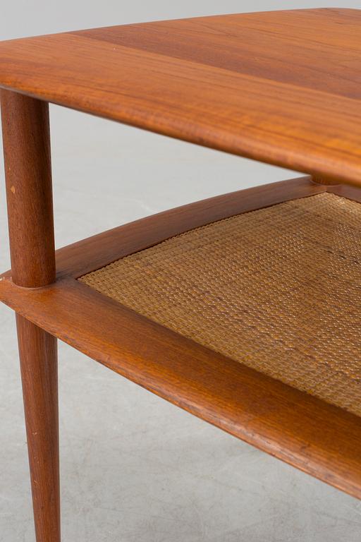 A 'Minerva' teak table by PETER HVIDT & ORLA MØLGAARD NIELSEN for France & Son, Denmark, 1950's/60's.