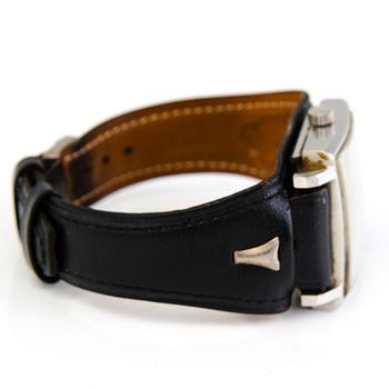 A steel Zenith wristwatch from 1960:s. 33x35mm.