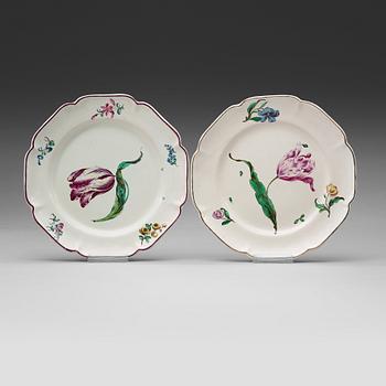 1370. Two Kiel faience dinner plates, circa 1770.