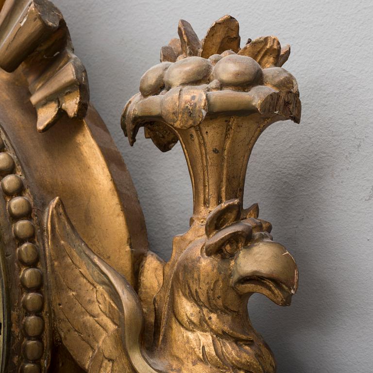 A late gustavian wall clock, signed Beurling, Stockholm. Late 18th / early 19th century.