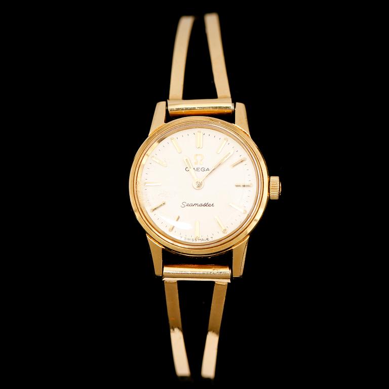 DAMARMBANDSUR, guld på stål, Omega Seamaster, stelt armband 18 k guld. Tot vikt ca 11 g.