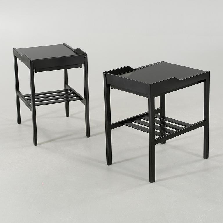 A paif of bedside tables by Bertil Fridhagen, from the latter half of the 20th century.