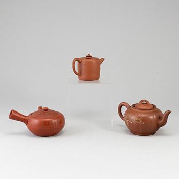 A group of three yixing pots, 20th century.