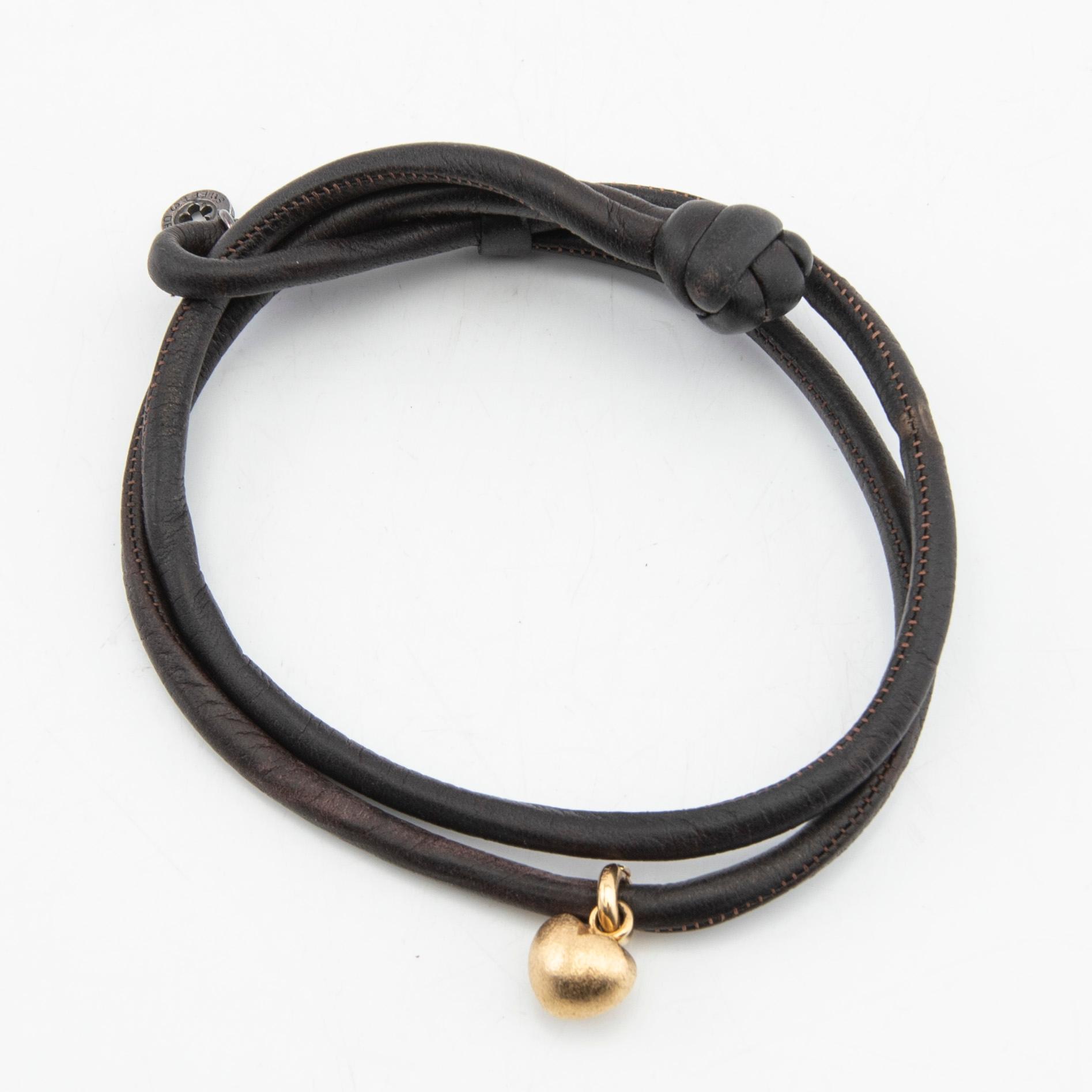 Ole Lynggaard, bracelet in leather with charm in 18k gold, "Sweet drops".