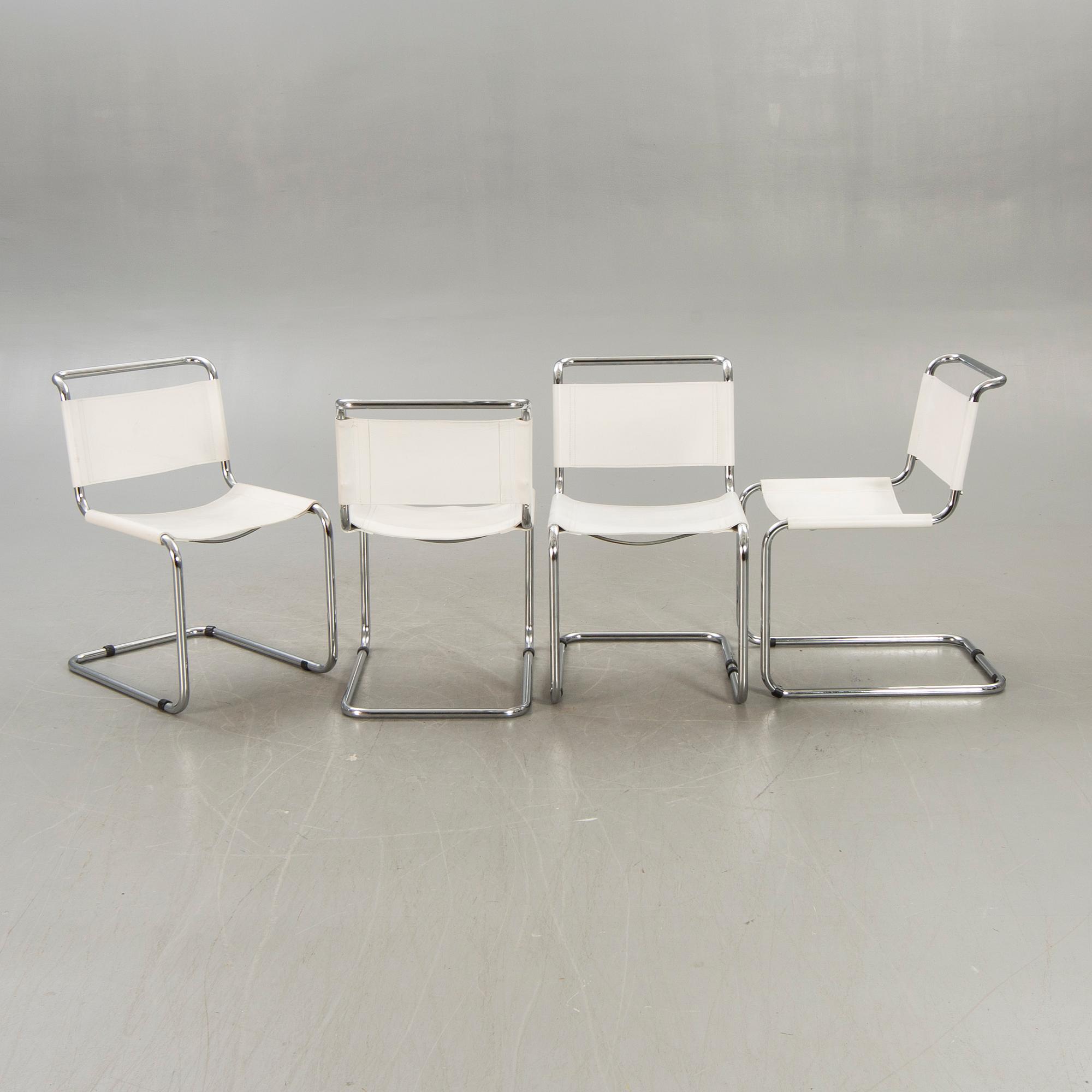 A set of four Italien chrome and leather chairs later part of the 20th century.