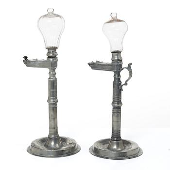 Oillamps, two similar, 19th century.
