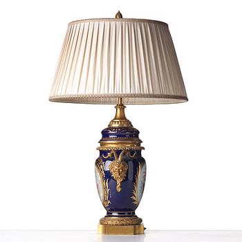 A French bronze mounted porcelain table lamp, late 19th Century, signed Thuilier.