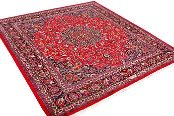 A Najafabad carpet, c. 351 X 305 cm.