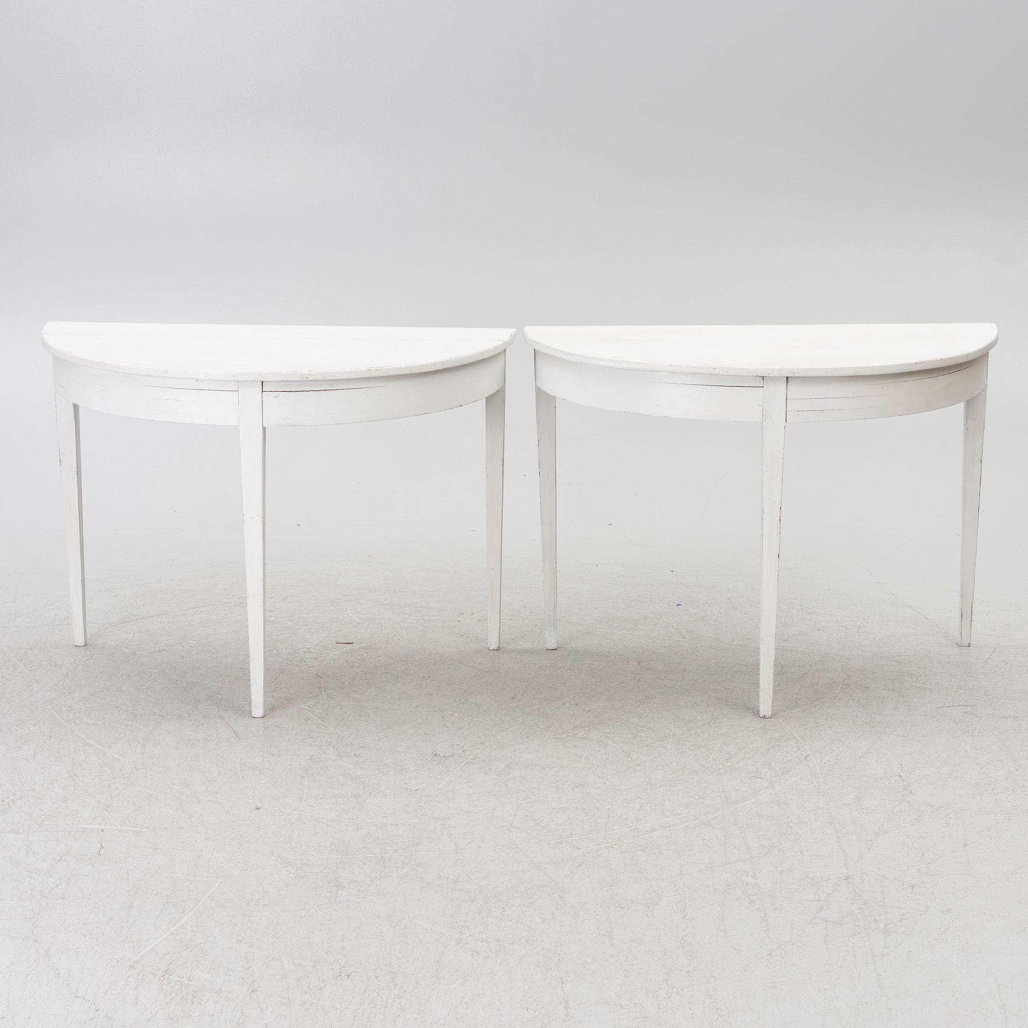 A pair of moon tables, 19th century.