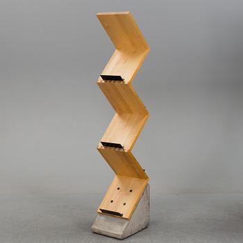 A "Zink" magazine rack, designed by Jonas Bohlin in 1984 for Källemo AB.