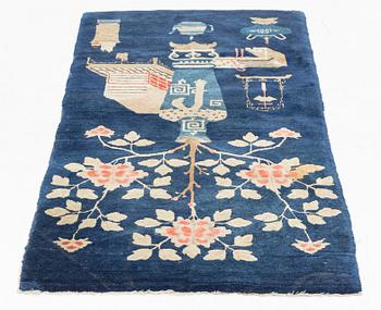A Boutou rug, China, c. 145 x 75 cm.