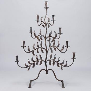 Paavo Tynell, A wrought iron floor candelabrum, oy Taito ab, dated 1926.