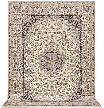 A carpet, Nain, part silk, 9 laa, c. 348 x 258 cm.
