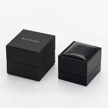 Bulgari, a platinum 'Venezia' ring with brilliant-cut diamonds.