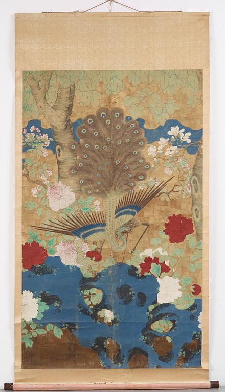 A hanging scroll of a peacock in a garden, Qing dynasty, presumably 19th century.